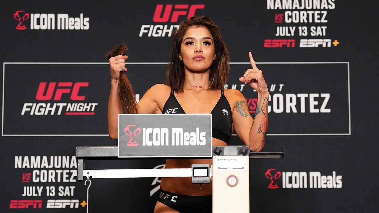 UFC fighter cuts hair to make weight for fight ‘No hesitation